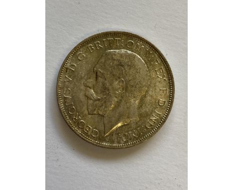 A GEORGE V FLORIN. A George V Florin, first coinage, bare head, l. dated 1919, with lustrous fields.
