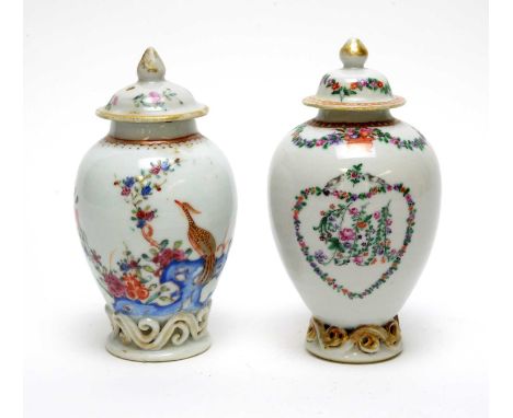 A Chinese famille rose tea caddy and cover, Qianlong, decorated with an exotic bird and flowers on rockwork, 13.5cms high; an