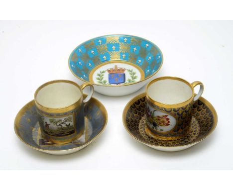 A 19th Century Sevres style saucer, decorated with a crowned armorial on a bleu de roi ground with gilt and white enamelled f