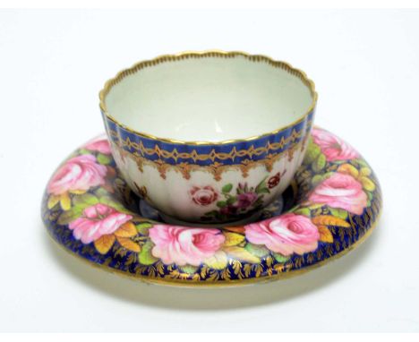 A First Period Worcester fluted tea bowl, circa 1770, decorated with an internal river landscape, the exterior with insects a