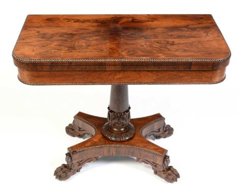 A William IV rosewood fold-over card table, stamped Gillows, the shaped top with beaded edge, enclosing a green baize lined p