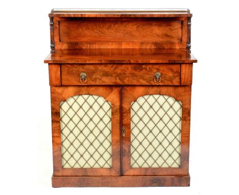 A Victorian mahogany chiffonier, the raised superstructure with three quarter pierced brass gallery and lotus clasped support