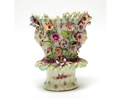 A Derby Frill Vase, circa 1770, with double masks, encrusted with flowers, painted with insects, patch marks, 16cms.