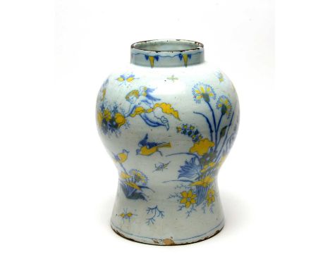 An 18th Century Delftware vase, probably South German, of baluster form, finely decorated in cobalt with cherubs, insects and