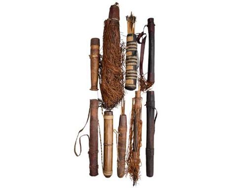 NINE QUIVERS, POSSIBLY AFRICAN, 19TH/20TH CENTURY the first of bamboo, with carved wooden base and rattan binding; the second