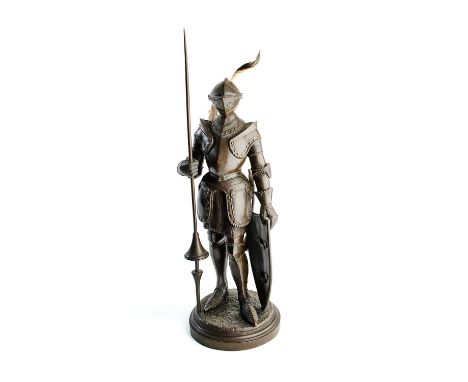 A BRONZE FIGURE IN 16TH CENTURY STYLE, LATE 19TH CENTURY standing in full armour in Italian mid-16th century style, including