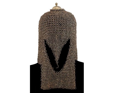 AN INDIAN MAIL HELMET (COIF), 17TH/18TH CENTURY 
of small riveted rings of alternating thin and thicker near round-section wi