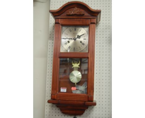 A reproduction Lincoln beech cased drop trunk wall clock