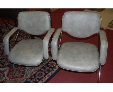 A pair of 1970s chrome framed and grey vinyl upholstered waiting room seats, mounted as a bench, w.123cm