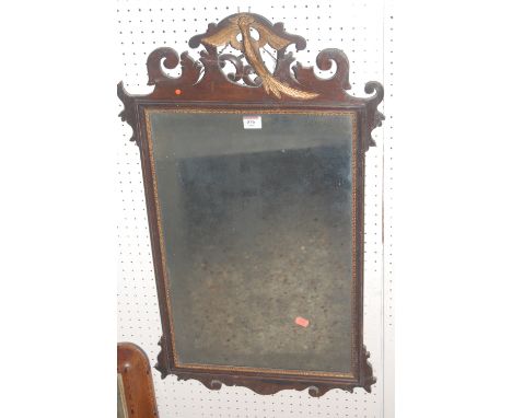 A circa 1900 Chippendale style fret carved mahogany wall mirror