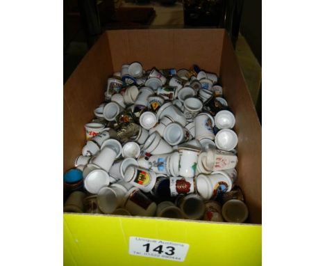 A good lot of ceramic thimbles.