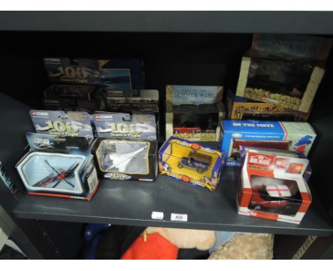 A shelf of modern Corgi and similar die-casts including 100 Years of Flight, Last of the Summer Wine etc, all boxed