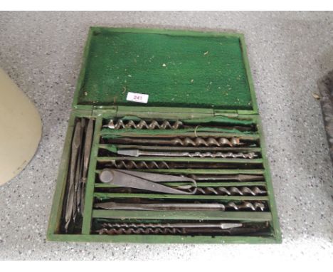 A boxed set of vintage wood drill bits