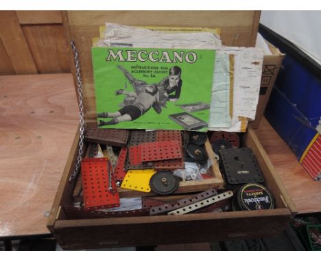A wooden case and a box of vintage Meccano, Meccano motors, instruction leaflets etc