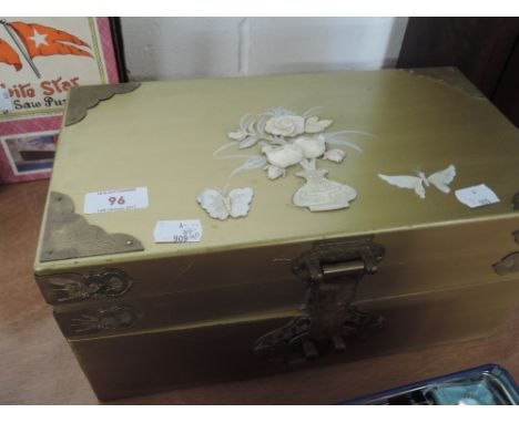 An ornamental treen jewellery box in the form of a trunk