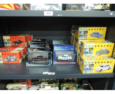 A shelf of modern Van Guards die-casts including MG collection, vintage cars etc, all boxed