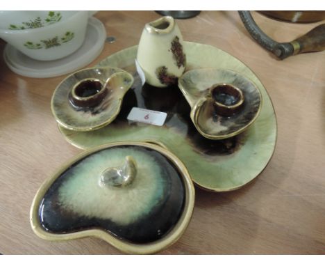 A collection of dressing table ceramic trinkets