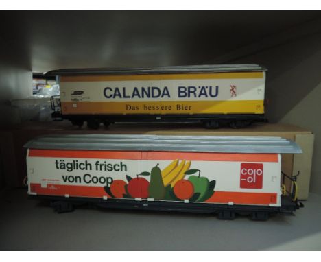 Two scratch built G scale vans Coop & Calanda Brau