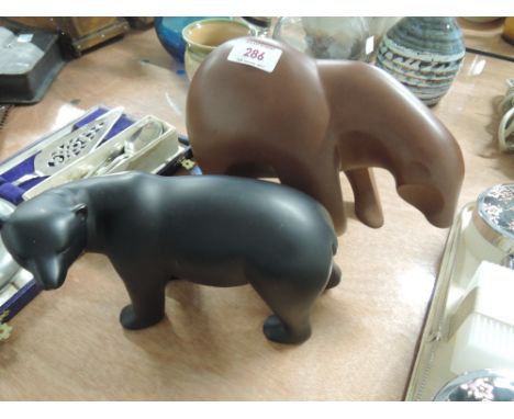 Two ceramic bear figurines in the style of Colin Melbourne