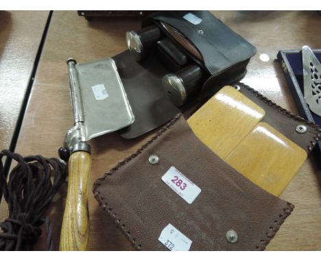 A Bakelite gents vanity set, clothes brushes and vintage seam press