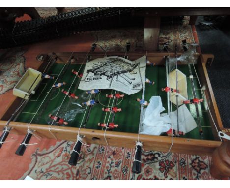 A Triang Pedigree Ltd table top football game with three footballs and assembly instruction leaflet 