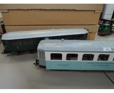 A scratch built G scale restaurant car and a similar coach