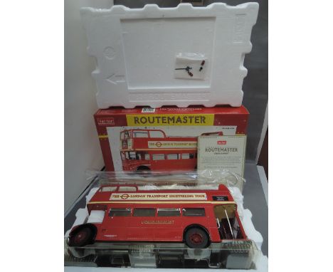 A Sunstar 1:24 scale diecast Routemaster London Transport sightseeing tour bus, boxed with wing mirrors and indicators