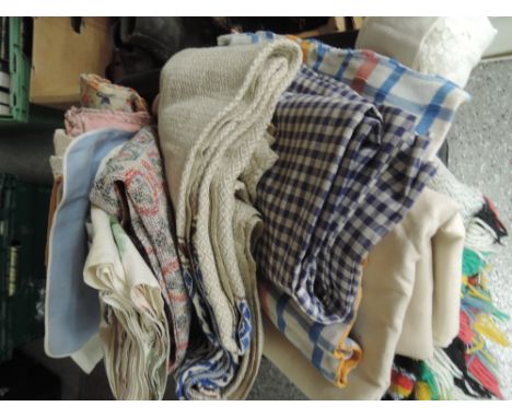 A selection of fabric including vintage cushion covers etc