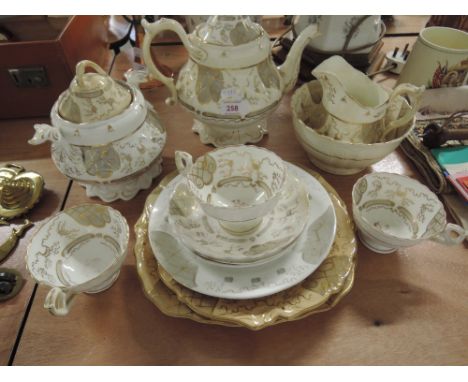 A part vintage tea service in gilt and cream design