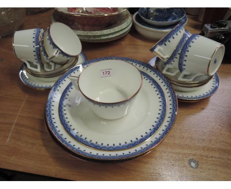 A Mintons part tea service in blue and gilt