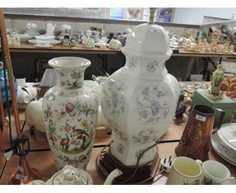 A ceramic table lamp and large vase with floral and pheasant decoration
