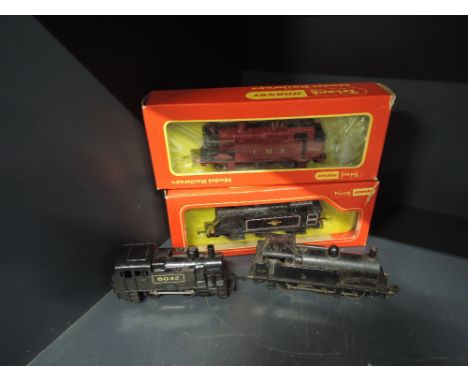 Three Hornby Dublo and Triang Hornby OO gauge 0-6-0 tank engines and a similar 0-4-0 tank engine, two boxed