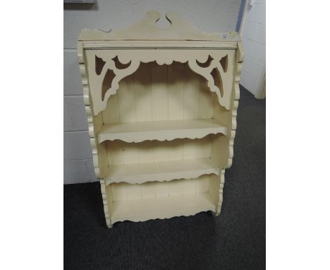 A painted wall shelf