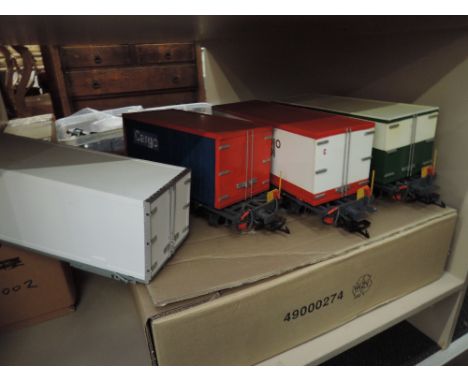 Three scratch built G scale container wagons and an extra container