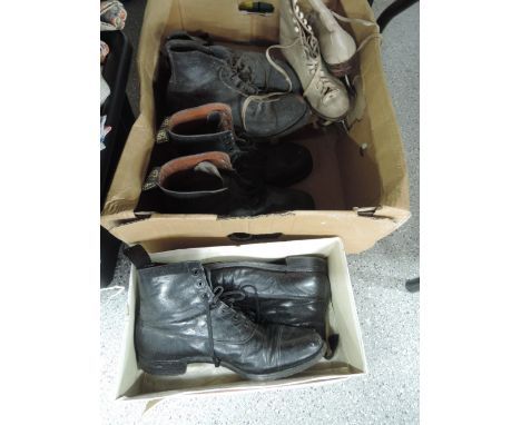 Two pairs of vintage ice skates, a pair of size 7 leather boots and a pair of work boots