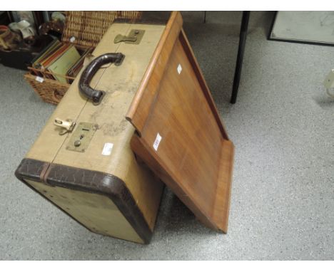 A treen folding breakfast tray and a vintage suitcase