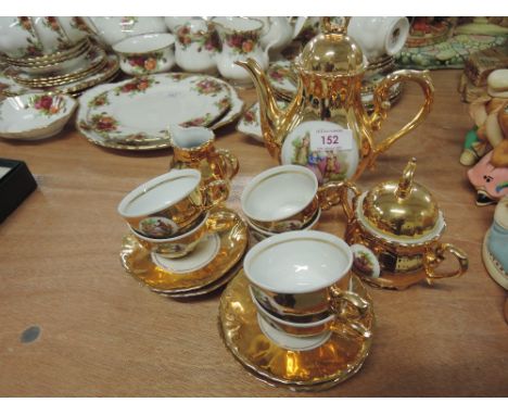 A Bondware gilt and transfer print coffee set