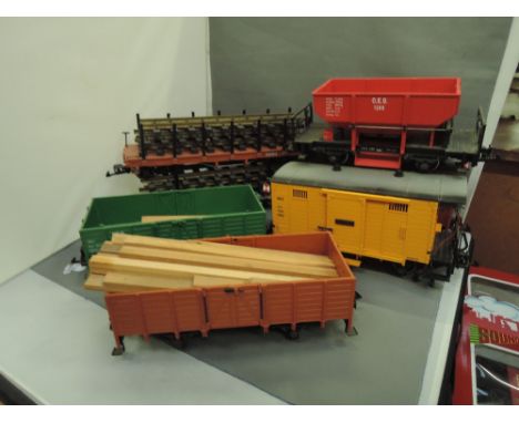 Seven LGB G scale items of rolling stock including track trailers, post vans etc