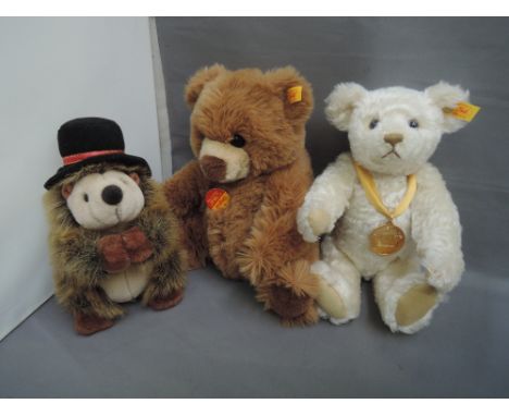 Two modern Steiff Teddy bears, Millennium and Brown Bear and a similar soft toy, Hedgehog 