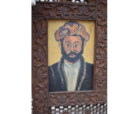 Eastern school, head and shoulder portrait of a man wearing a turban, oil on board, 15 x 10cm. 