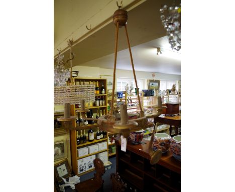 A classical style giltwood six branch ceiling light.