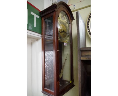 A reproduction mahogany musical wall clock, by Comitti, striking on 8 straight gongs, 77cm high.  Condition Report: Minor scr