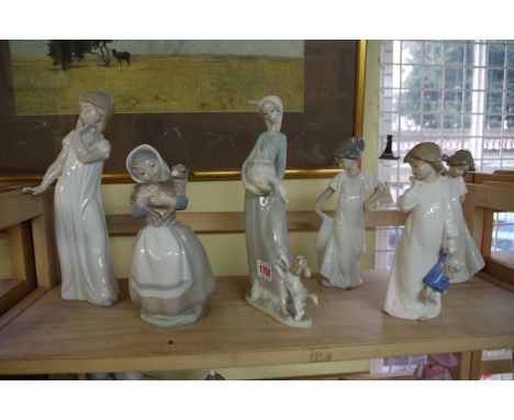 Two Lladro figures; together with six Nao figures; and others.