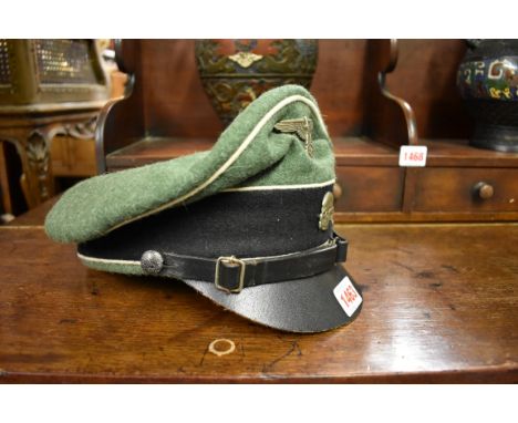 A German officer's army cap, with badges. 