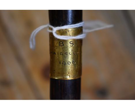 An Edwardian 18ct gold mounted bamboo walking stick, hallmarked Charles Cooke, London 1906, stamped 'Brigg' and inscribed 'Cr