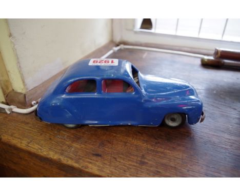 A Chad Valley tinplate clockwork Harborne car, with original key. 