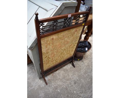 A circa 1920 mahogany firescreen, 58.5cm wide. 