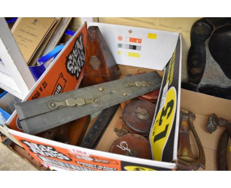A mixed lot, to include: tape measures; folding rules; a metronome, etc. 