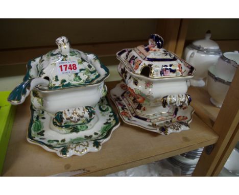 Two Masons ironstone sauce tureens, covers and stands, one with ladle.    Condition Report:  No damage seen to either.Green a
