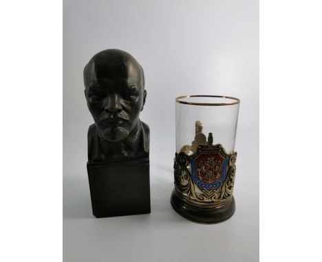 Vladimir Lenin bronze effect bust, Russia, with number and cyrilic name, 17.5cm high and a Russian tea glass with plated foli
